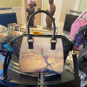 Like new loungefly purse. Used twice lion king.
